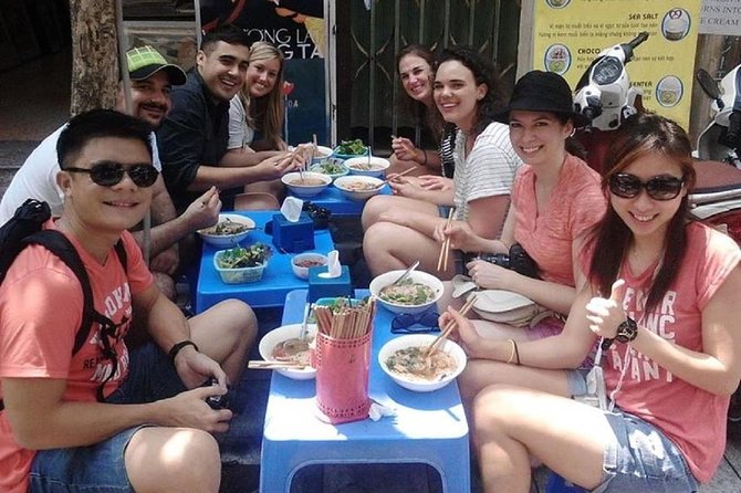 Hanoi City Street Food Night Tour by Motorscooter - Dong Xuan Market and a taste of local commerce