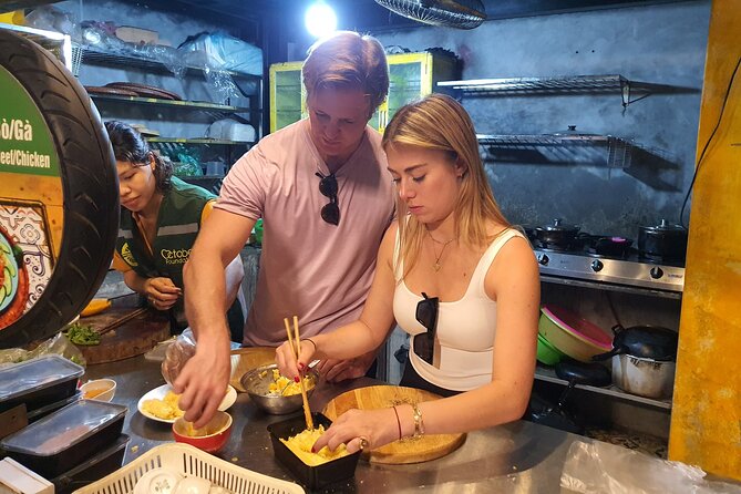 Hanoi Michelin Star Walking Food Tour & Train Street - Ten Hanoi tastes, from bánh mì to eel noodles