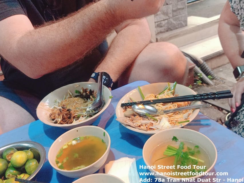 Hanoi: Old Quarter Street Food Walking Tour with 10 Tastings - Fruit, ice, and condensed milk in a narrow lane