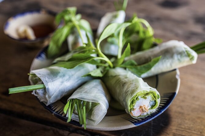 Hanoi Street Food Tour By Motorbike + Sightseeing SAFE & FUN - Old Town and steamed rice pancakes on Hang Ga