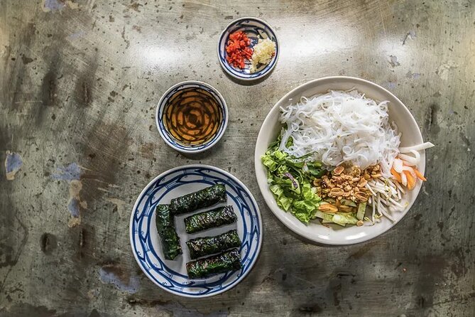 Hanoi Street Food Tour By Motorbike + Sightseeing SAFE & FUN - Oc Di Tu and West Lake seafood