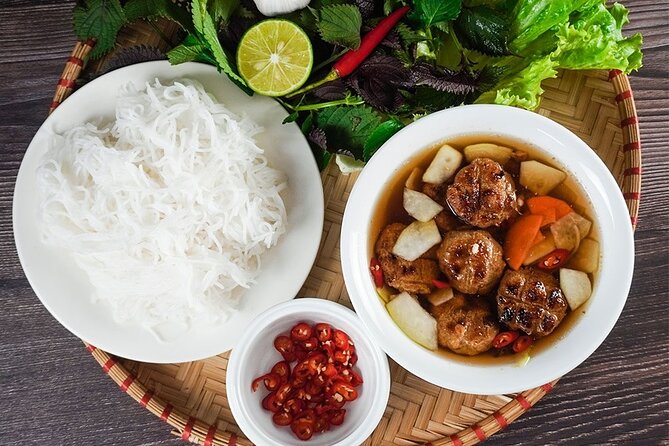 Hanoi Street Food Tour Taste 6 Local Dishes and Drinks - Banh mi brings a familiar format with a Hanoi accent