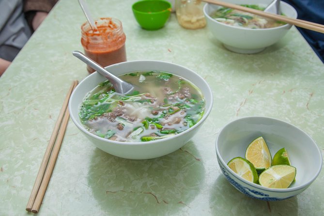 Hanoi Street Food Walking Tour and Water Puppet Show - What the guides add to the meal
