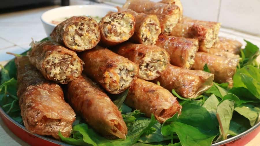 Hanoi: Vietnamese Street Food Tour with Local Guide - The first tastes: salad, grilled pork, and noodle soup
