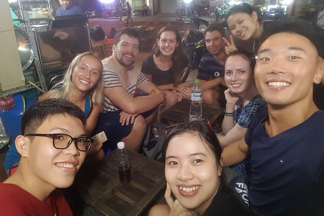 Hidden Gems Private Street Food by scooters with girl drivers. - Riding through Bùi Viện Street and the Saigon River
