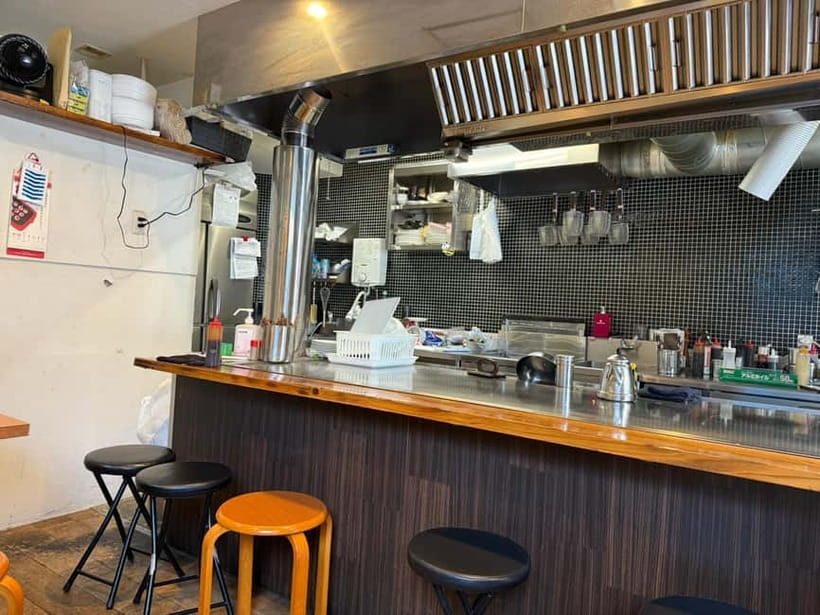 Hiroshima: Okonomiyaki Cooking Class with a Local Chef - What the guide and chef add