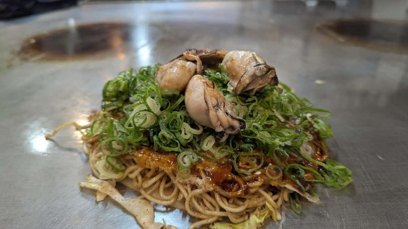 Hiroshima: Okonomiyaki Cooking Class with a Local Chef - The tram ride adds a local layer