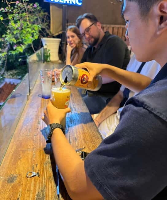 Ho Chi Minh City: Craft Beer and Local Food Tour by Scooter - What you learn about Saigon after dark