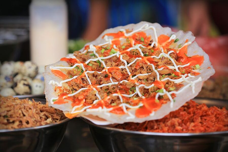 Ho Chi Minh City’s Most Tasty Street Food Tour by Motorbike - Pickup districts, clothing, and rain planning