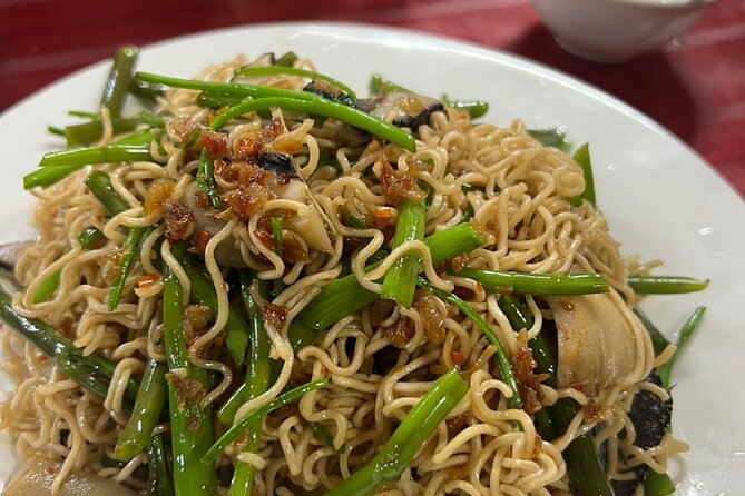Ho Chi Minh City Sightseeing & Street Food Tasting Experience - Ho Thi Ky Market: flowers, snacks, and a strong start