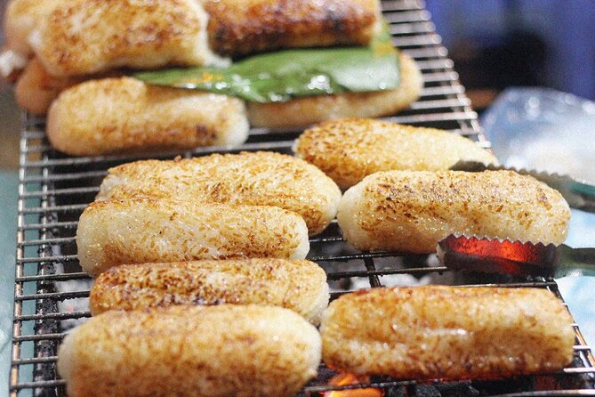 Ho Chi Minh City Street Food Tour & Sightseeing By Motorbike - Stop 3: Grilled banana with coconut sauce