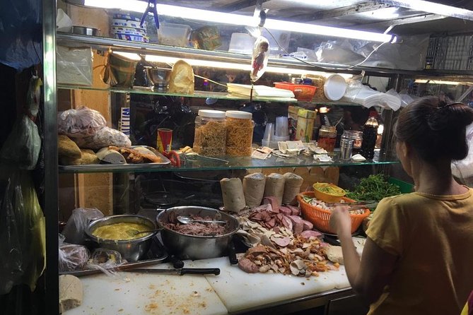 Ho Chi Minh City: Street Food Walking Tour with 12 Tastings - What the scooter setup means for you