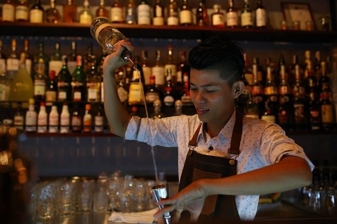 Ho Chi Minh Nightlife & Street Food Tour By Motorbike - Bitexco Financial Tower and the city center