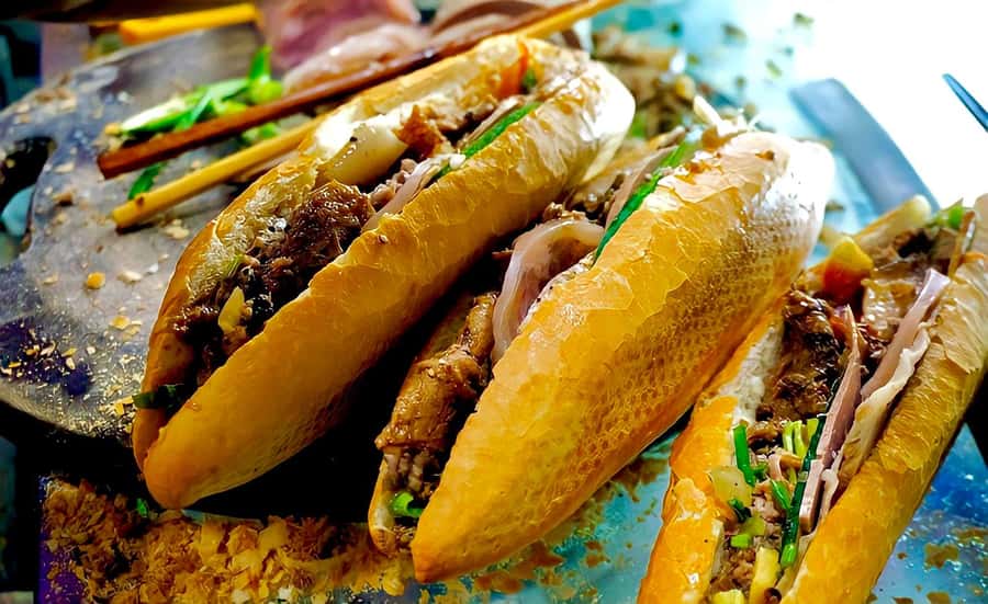 Hoi An Street Food Tour with Locals - Walking into Hoi An’s evening food scene