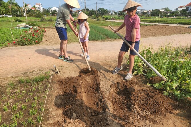 Hoi An Village Experience & Hoi An City Tour with Night Market - Hoi An Ancient Town and its landmark buildings