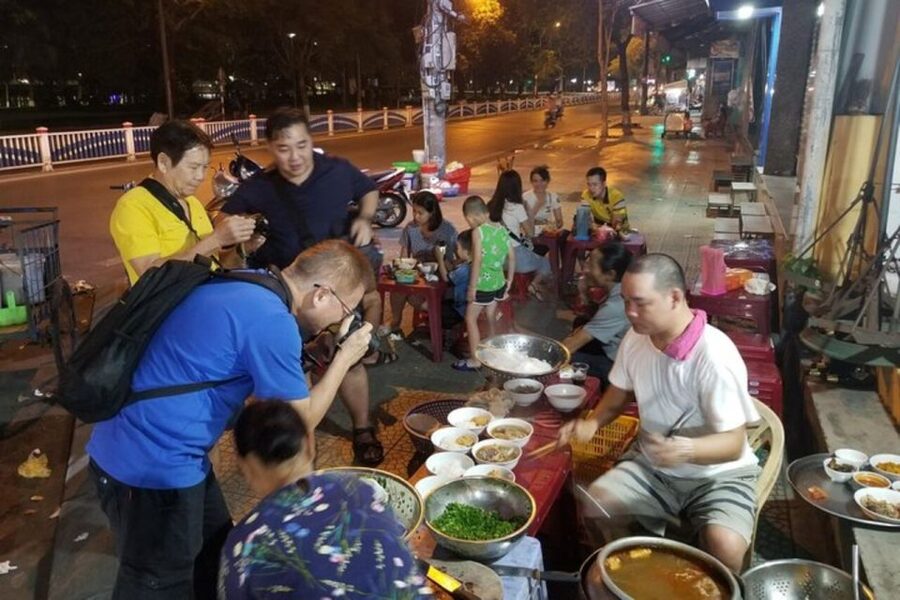 Hue: Night Street Food Tour by Cyclo with a Local Guide - Truong Tien Bridge gives the route a clear ending