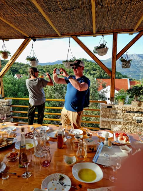 Korcula: Buggy Safari with Local Food and Wine Tasting - Korčula by buggy, with a family table at the end