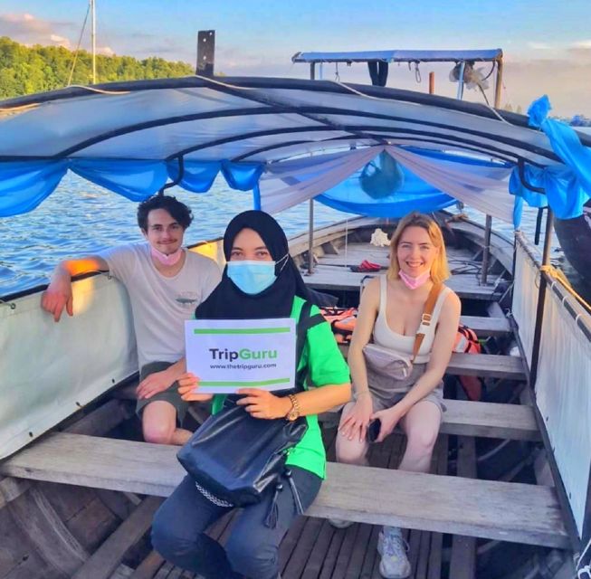 Krabi: Private Sunset Boat Trip and Night Market Tour - A quiet boat ride to Khao Khanap Nam