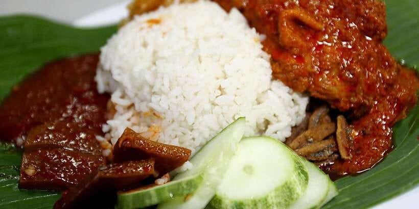 Kuala Lumpur: Half Day Local Food Walking Tour - The train ride changes the mood of the afternoon