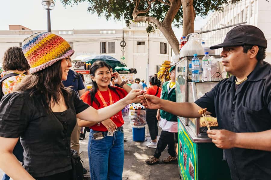 Lima: Historic Center Street Food, Market, and Eateries Tour - Colonial facades between bites