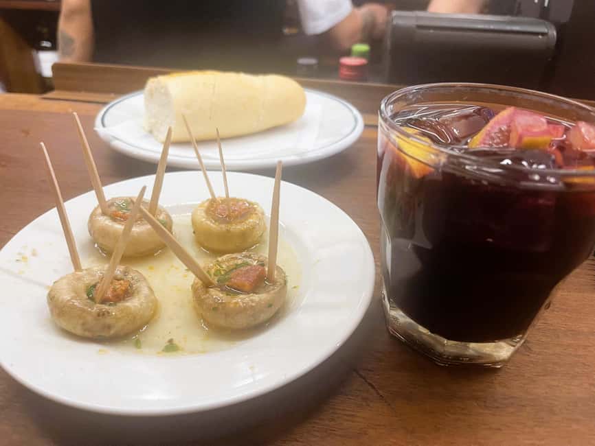 Madrid: Guided Local Food Tour at Hidden Gem Restaurants - Ham and Spider Crab Croquettes