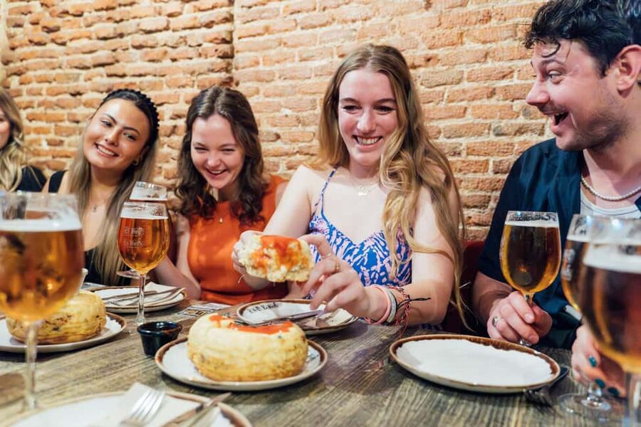 Madrid: Tapas Food Crawl with 6 Tapas and 4 Drinks - What the four drinks add to the evening