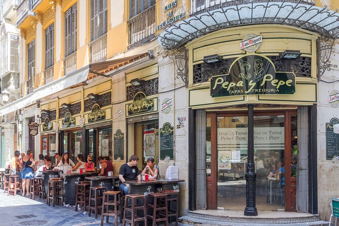 Malaga Market Food Tour: Tapas, Drinks, and Local Flavors - Plaza de la Merced and Andalusian flavors