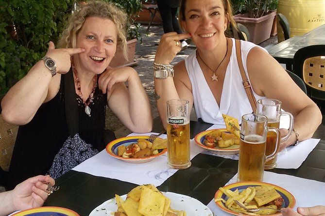 Markets and monuments: walking tour and street food in Palermo - Starting at Piazza Olivella and Finding Your Bearings