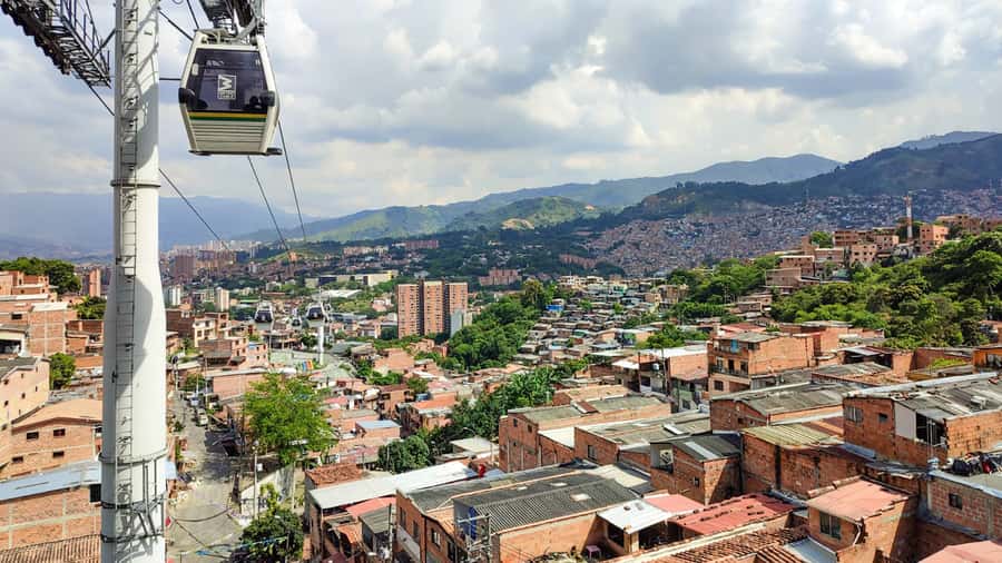 Medellin: Comuna 13 Graffiti Tour, Cable Car & Street Food - Arepa, dance, and a drink with a view