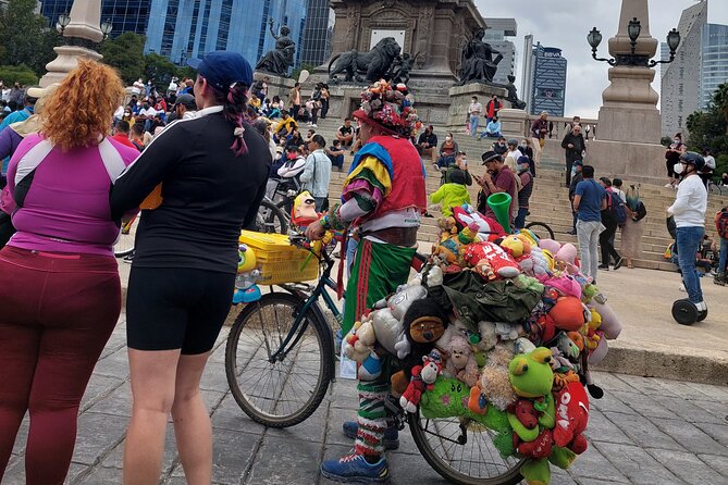 Mexico City E-Bike Tour with a taco and churros stop - Chapultepec brings trees, space, and a castle
