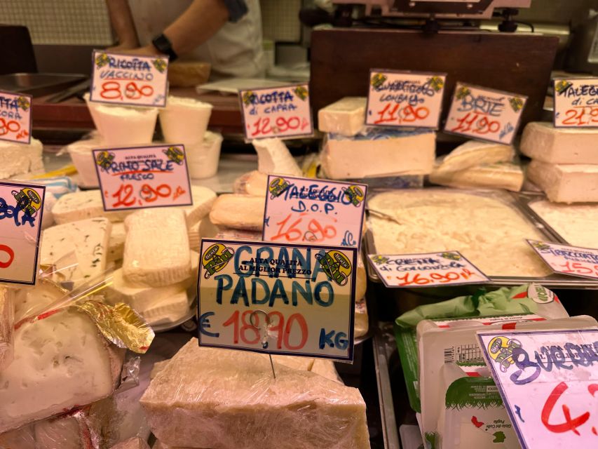 Milan: Gourmet Street Food Tour with Sightseeing and Tasting - Ham, cheese, and local shop stops