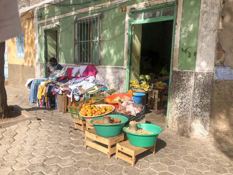 Mindelo: Private Walking Tour with Local Food Tasting - Craft shops, Grogue, coffee, and spending decisions