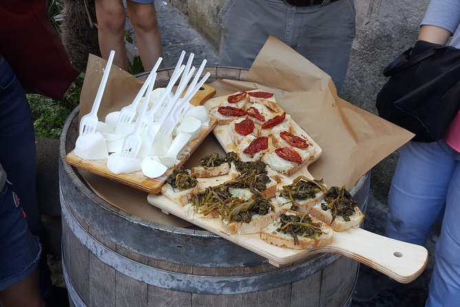 Naples Street Food Tour: Discover Local Flavors with Expert Guide - Piazza Bellini begins with ruins and mozzarella