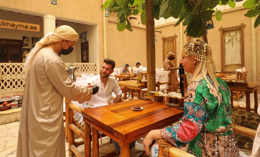 Old Dubai Historic Guided Tour: Creek, Street Food & Souks - Karak tea, samosas, and the food side of the walk