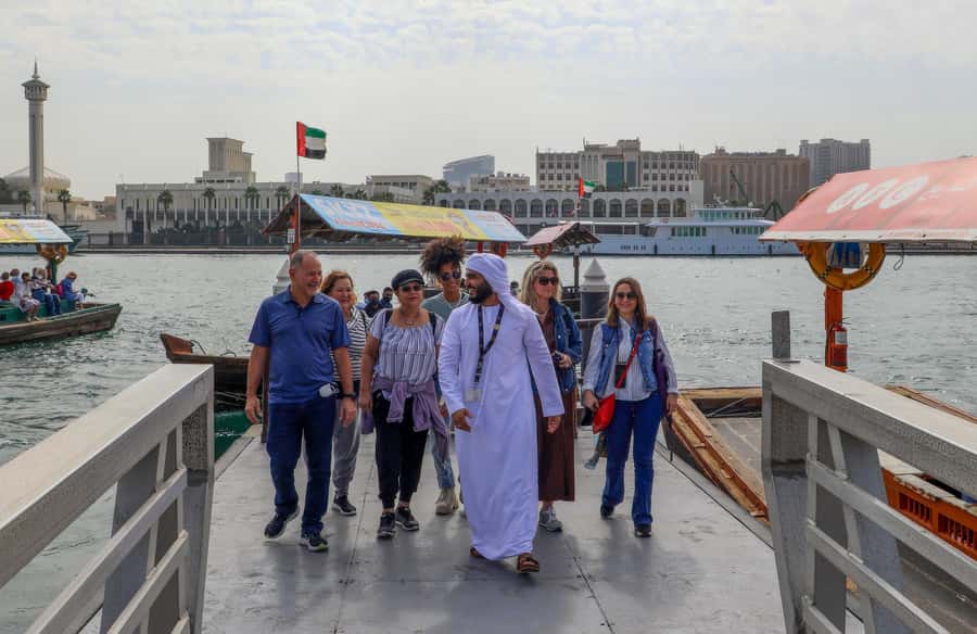 Old Dubai Historic Guided Tour: Creek, Street Food & Souks - Guides, languages, and the pace of the experience