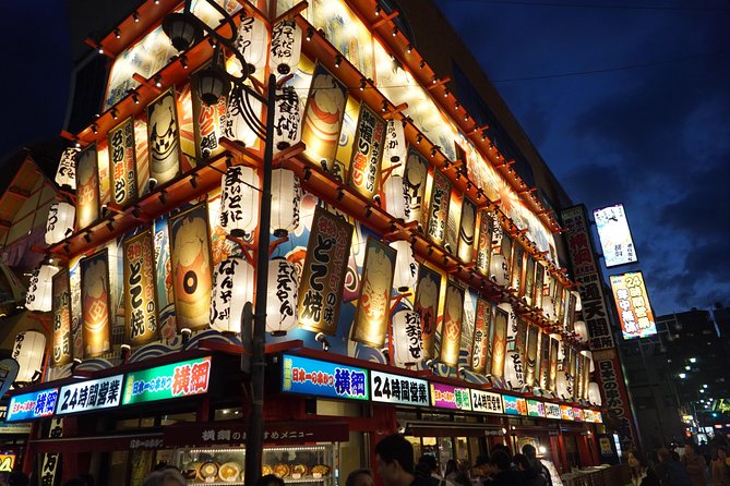Osaka Local Foodie Walking Tour in Dotonbori and Shinsekai - Hozen-ji Temple, Ukiyo Alley, and the Glico sign