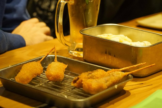 Osaka Local Foodie Walking Tour in Dotonbori and Shinsekai - Jan-Jan Yokocho and the old Shinsekai mood