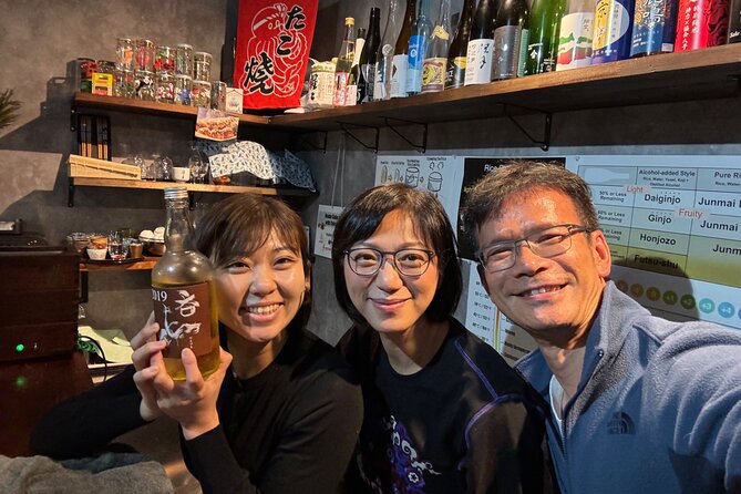 Osaka Sake Tasting & Takoyaki Cooking Experience - The best part is eating and tasting together