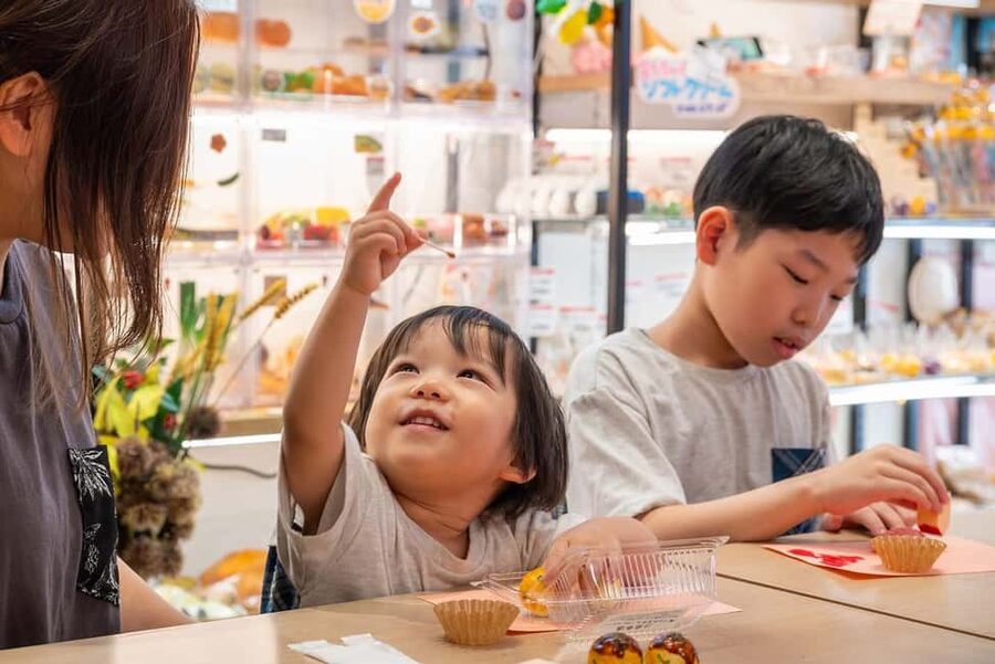 Osaka: Takoyaki Keychain and Magnet-Food Replica Workshop - Adding green onions, ginger, and sauce