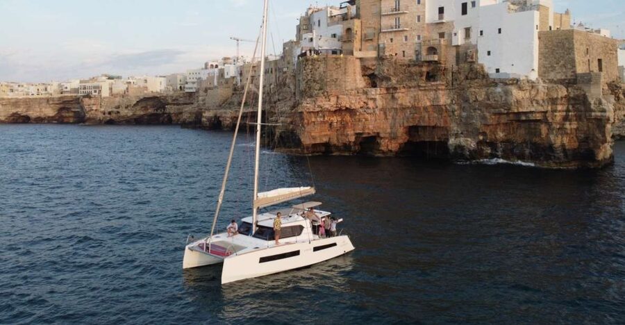 Polignano a Mare: Catamaran Tour with Aperitif & Local Food - Lama Monachile and the town’s postcard view