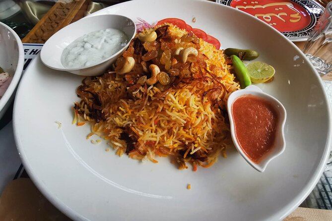 Private Dubai Street Food Tour . - Starting with an Indian temple and Meena Bazaar