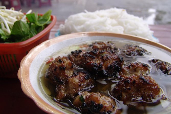 Private Hanoi Street Food Walking Tour With Real Foodie - Ten dishes, several stops, and a changing menu