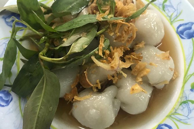 Private Ho Chi Minh Street Food Tour by Motorbike with Ao Dai Female Rider - Old apartments, coconut ice cream, and a 1975 dessert shop