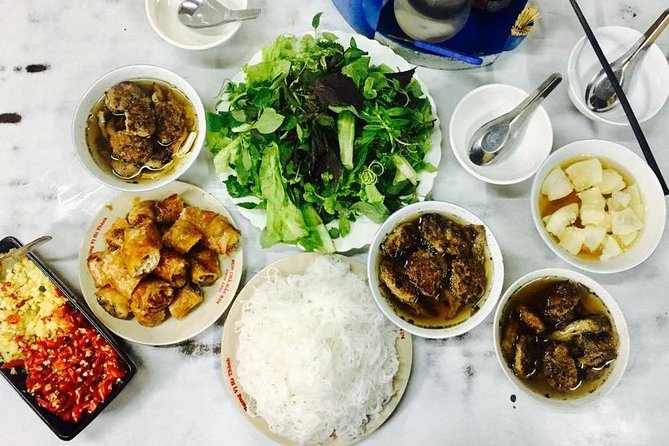 (Private/Motor/Cutural) Street food experience in Hanoi old quarter - French-era landmarks along the route
