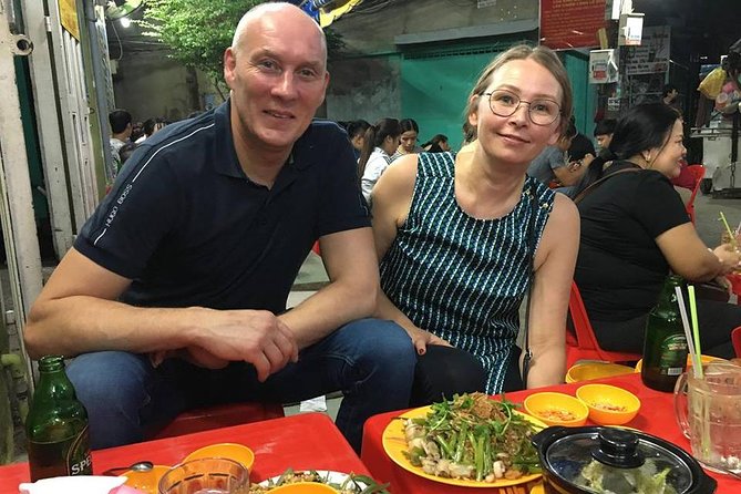 Private Saigon Street Food Tour with Motorbike - Stop four: snails and a local seafood buffet