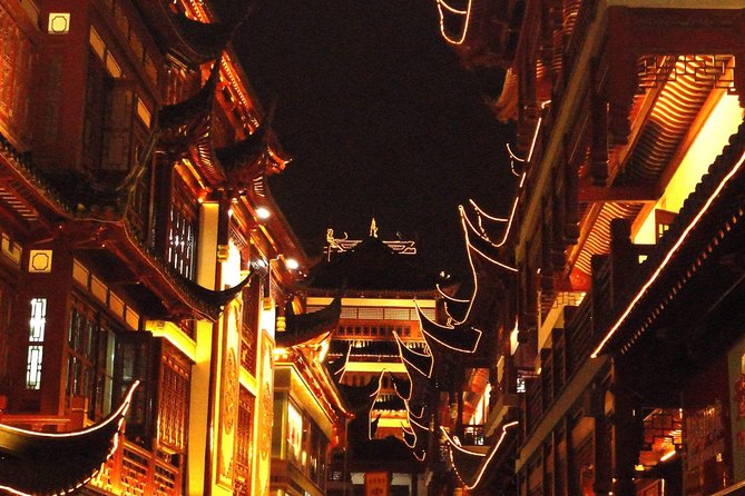 Private Shanghai Evening Street Food Walking and Cruise Tour - Walking through the Old Town toward the Bund