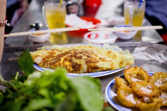 Private Street Food Motorbike Tour in Ho Chi Minh City - District 5 and the apartment pagoda