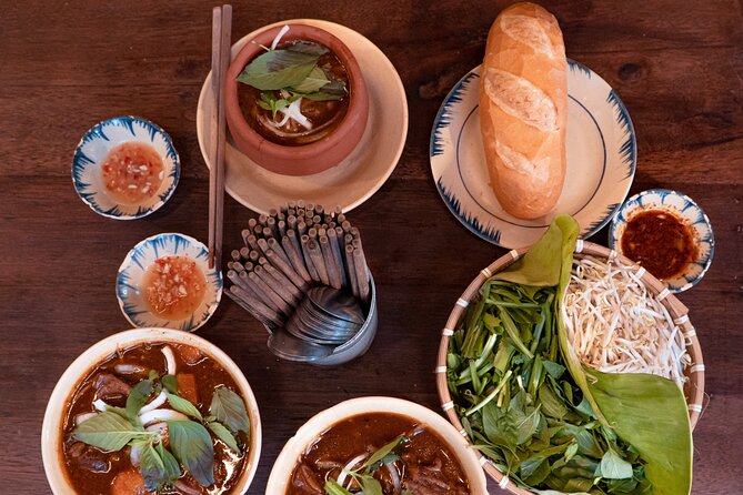Private Street Food Motorbike Tour in Ho Chi Minh City - Safety, rain, and comfort on the road