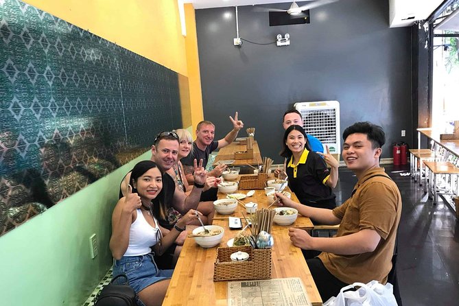 Private Street Food Tour by Scooter with Hotel Pickup - Stop two: bánh xèo and bánh khọt with a cooking lesson