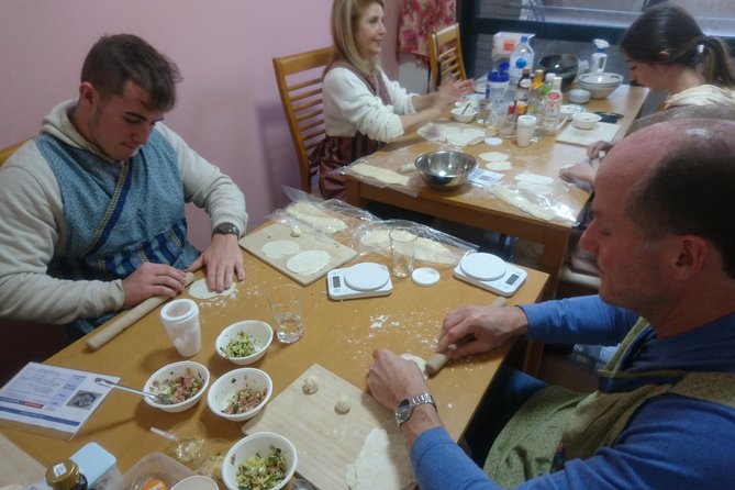Ramen and Gyoza Cooking Class in Osaka - Shaping two very different gyoza